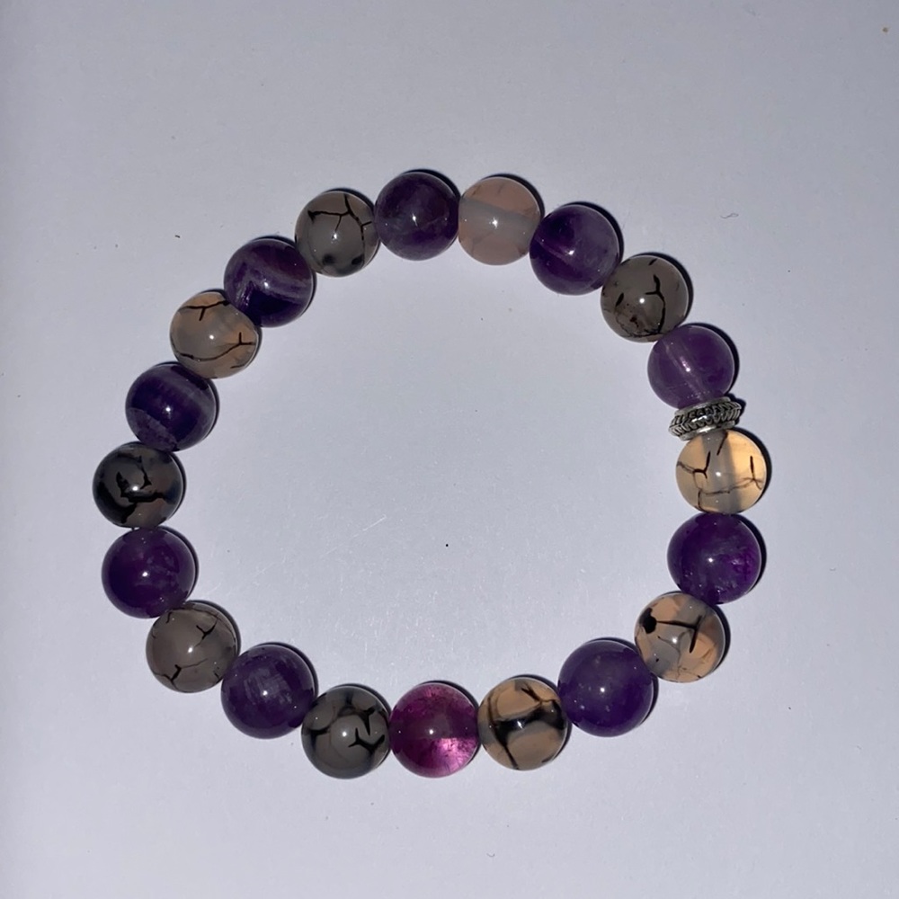 Amethyst and tourmalinated quartz bracelet